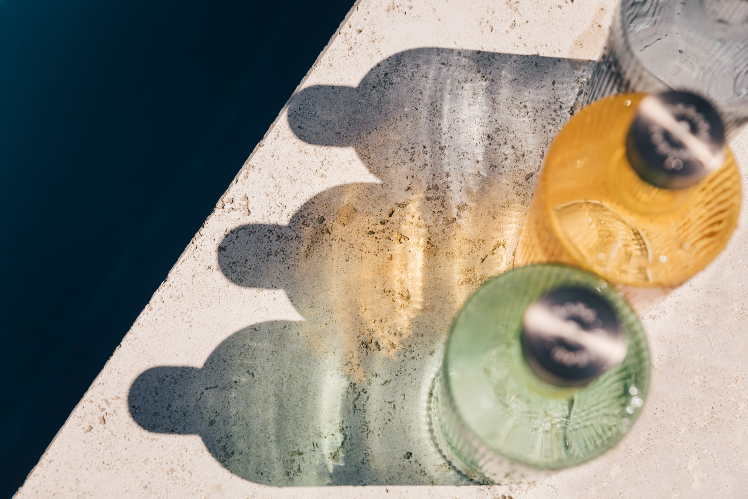 view from above of three handcrafted glass carafes