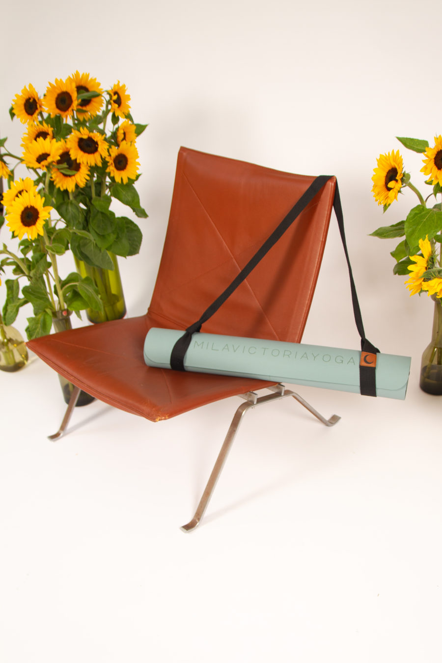 yoga mat presented on a chair