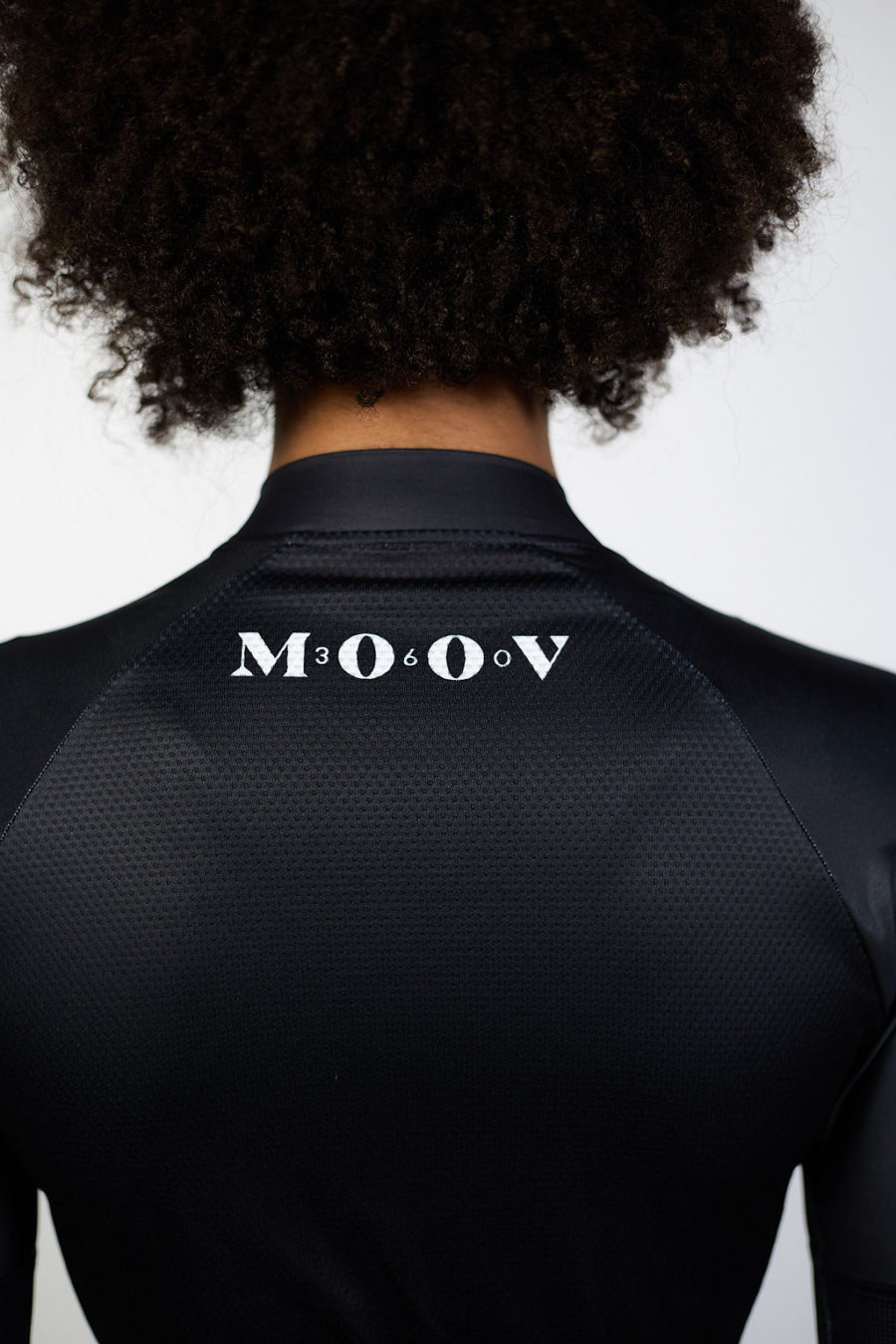 Cycling jersey on a woman from the back