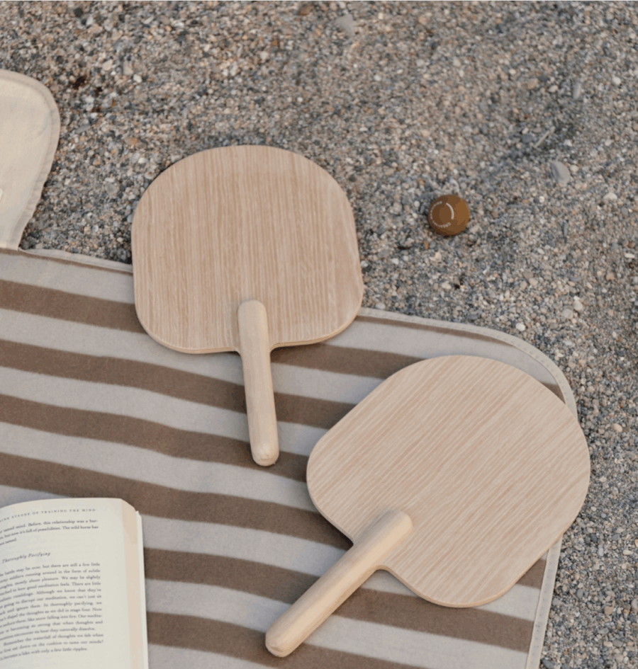 Miro beach game on a towel at the beach