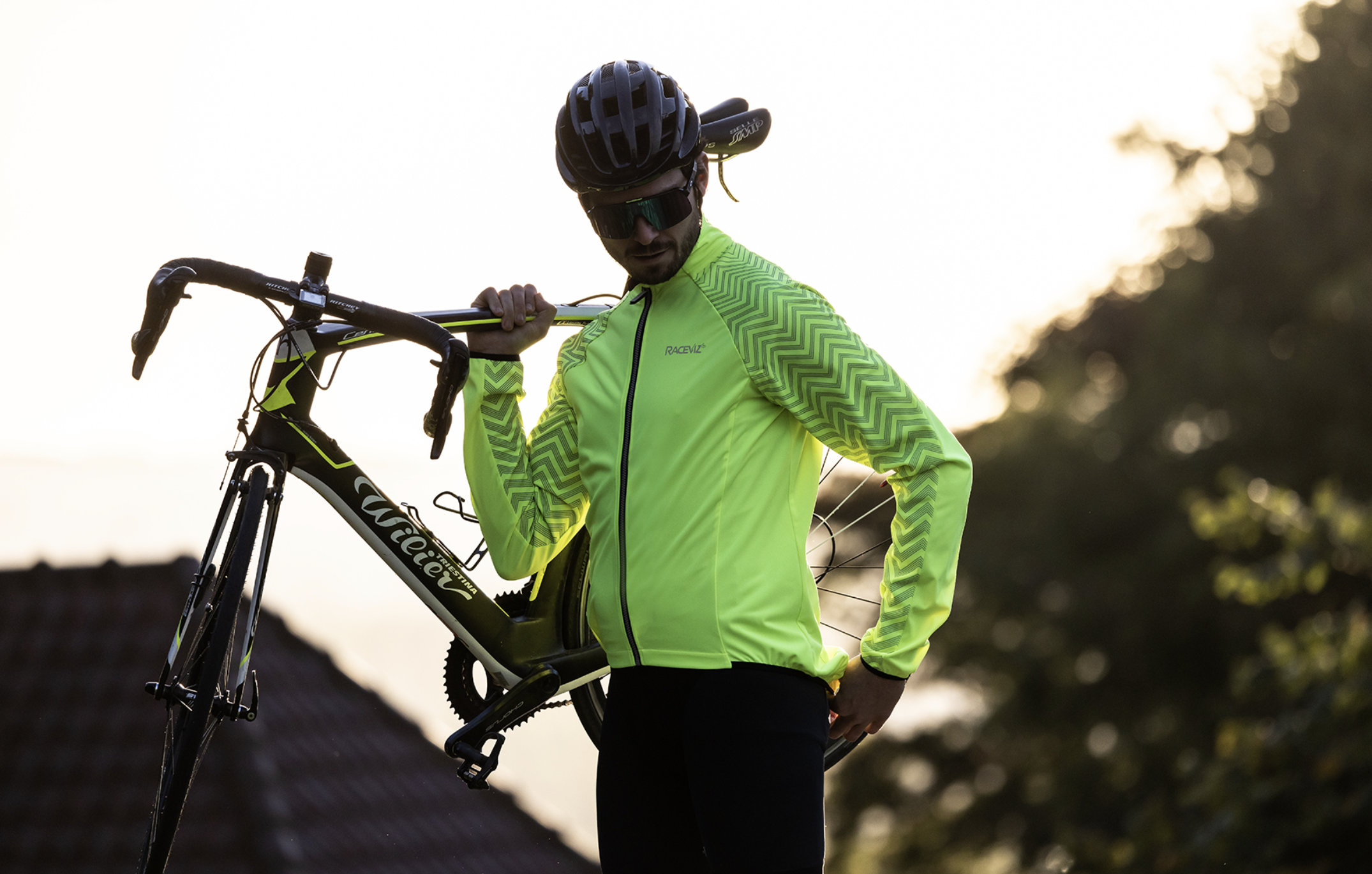biker wearing the classic cycling jacket and his bike